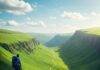 The Ultimate Guide to Hidden Hiking Trails for Adventure Seekers Hiker overlooking lush green valley.