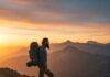 Best Backpacking Routes in North America for Adventure Lovers Backpacker at sunrise mountain vista