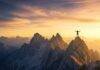 Mountain Adventures for Thrill Seekers: Top Hiking & Climbing Spots Lone climber on mountain peak at golden hour.