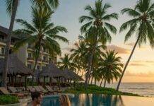 Unwind in Paradise: The Best Luxury Beach Resorts and Escapes Luxury tropical resort sunset pool