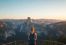 Ultimate Guide to the Best U.S. Destinations for Solo Travelers Solo traveler overlooking scenic US landscape.