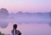 The Best Solo Activities for Finding Peace and Clarity Sunrise yoga by the lake