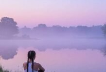 The Best Solo Activities for Finding Peace and Clarity Sunrise yoga by the lake