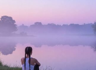 The Best Solo Activities for Finding Peace and Clarity Sunrise yoga by the lake
