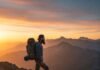 Best Backpacking Routes in North America for Adventure Lovers Backpacker at sunrise mountain vista