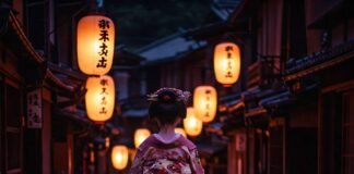 Exploring Kyoto’s Unique Culture: Top Things to Do in Japan’s Ancient Capital Geisha in kimono on lantern-lit street.