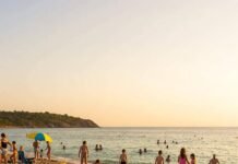 10 Perfect Family-Friendly Beaches You Won’t Want to Miss Family beach fun: Golden hour, calm waters & happy families.